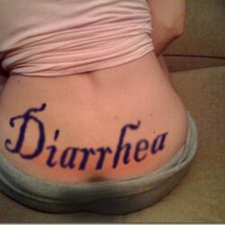 Stripper Branded with Diarrhea Tramp Stamp